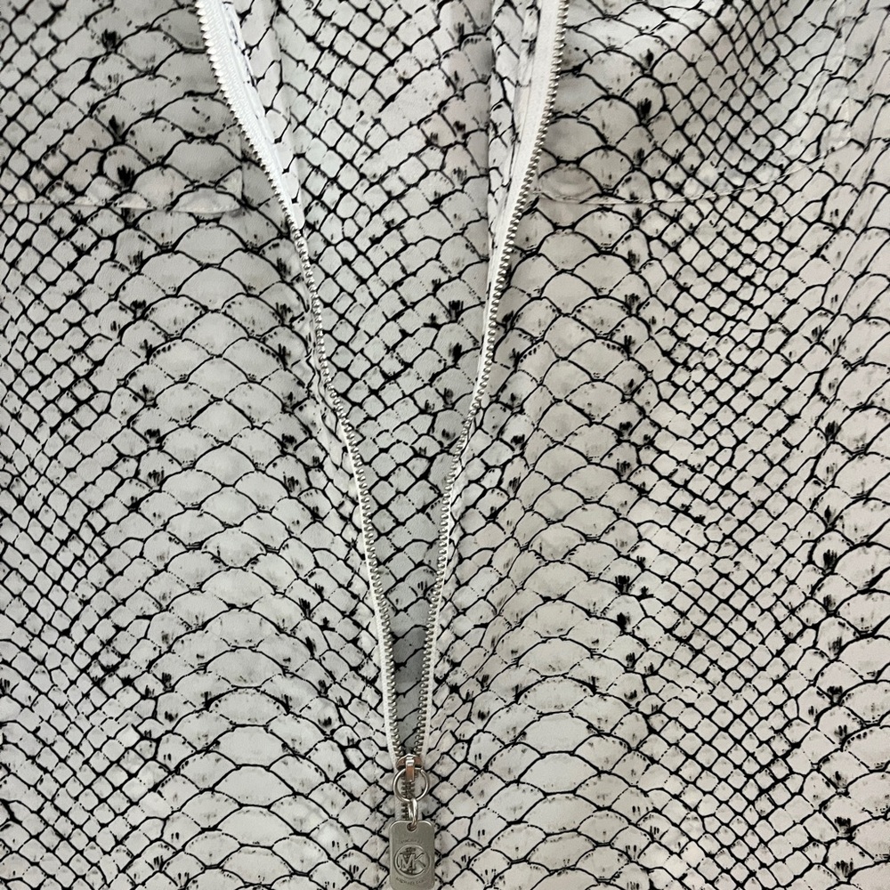 Michael Kors blouse/jacket,size L, 100 percent polyester.